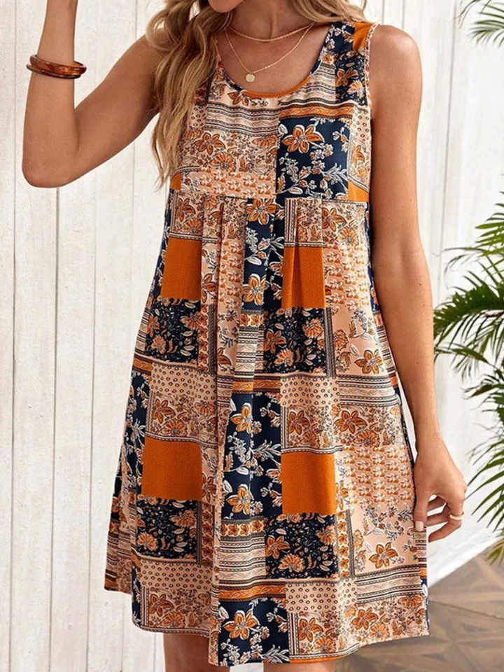 Jacinta - Miniabito senza maniche con patchwork floreale retrò