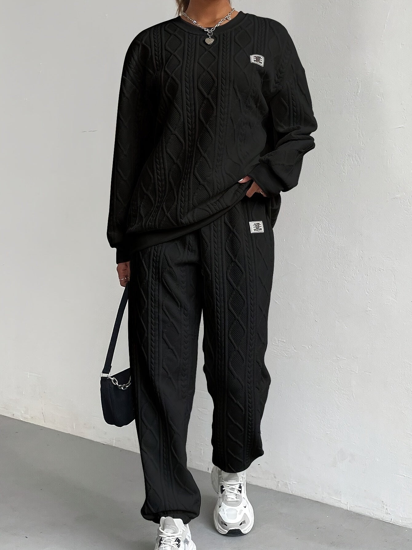 Fianna - Completo lounge in maglia a trecce